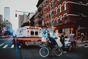 Ambulance with lights on, symbolizing trauma treatment through EMDR therapy.