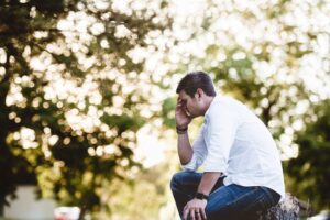 Man appearing depressed, emphasizing depression therapy in Denver.