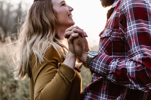 A happy couple enjoying a healthy relationship through understanding each other