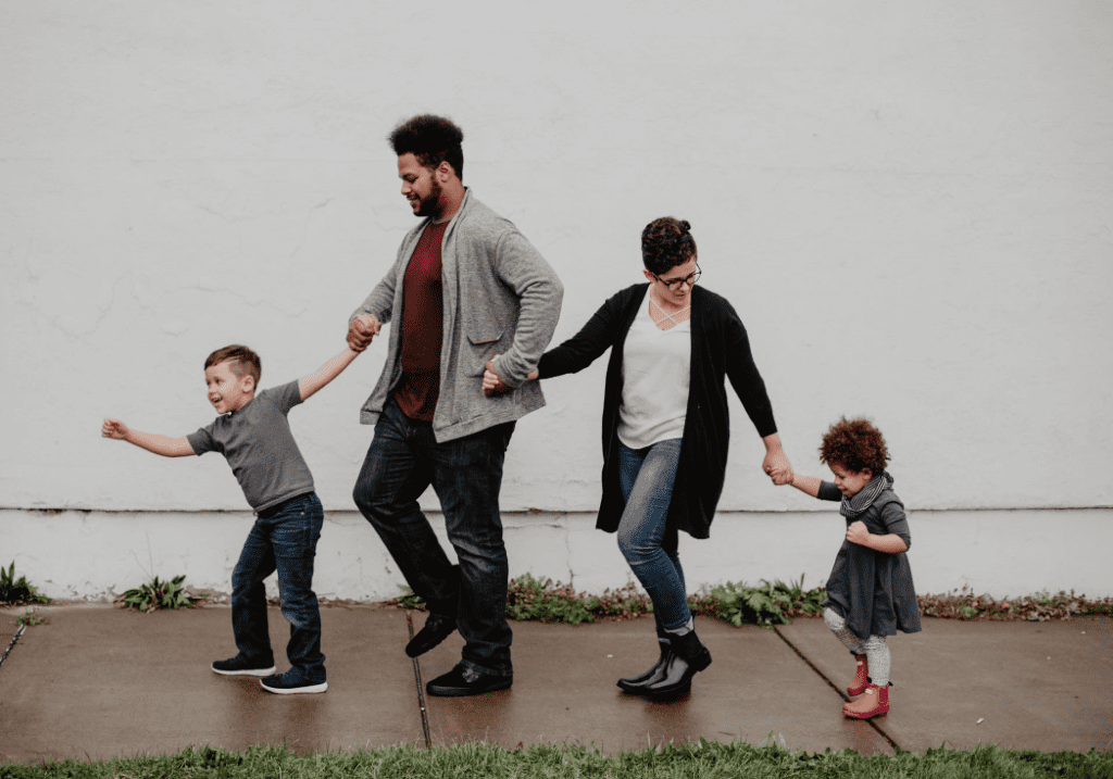 Happy family enjoys a walk together outdoors