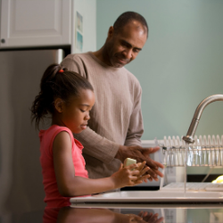 Man happily spending time with daughter