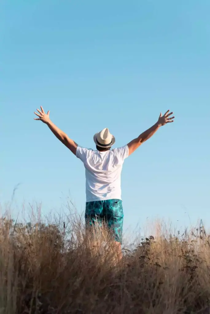 a man feeling the fresh air after healing from religious trauma