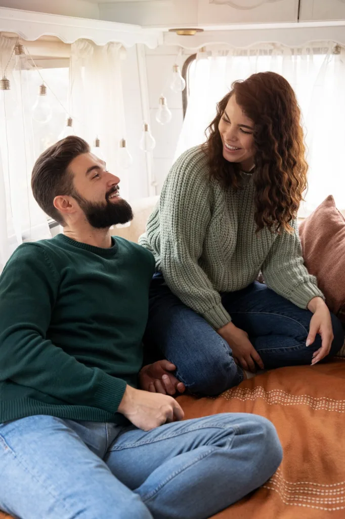 A couple smiling after couples counseling in denver