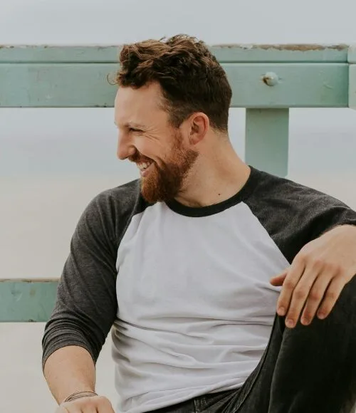 A happy man reflecting the positive impact of anxiety therapy in Denver