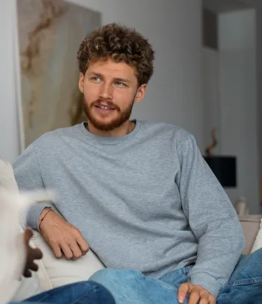 A man openly discussing his concerns with an EMDR therapist in Denver, Colorado.