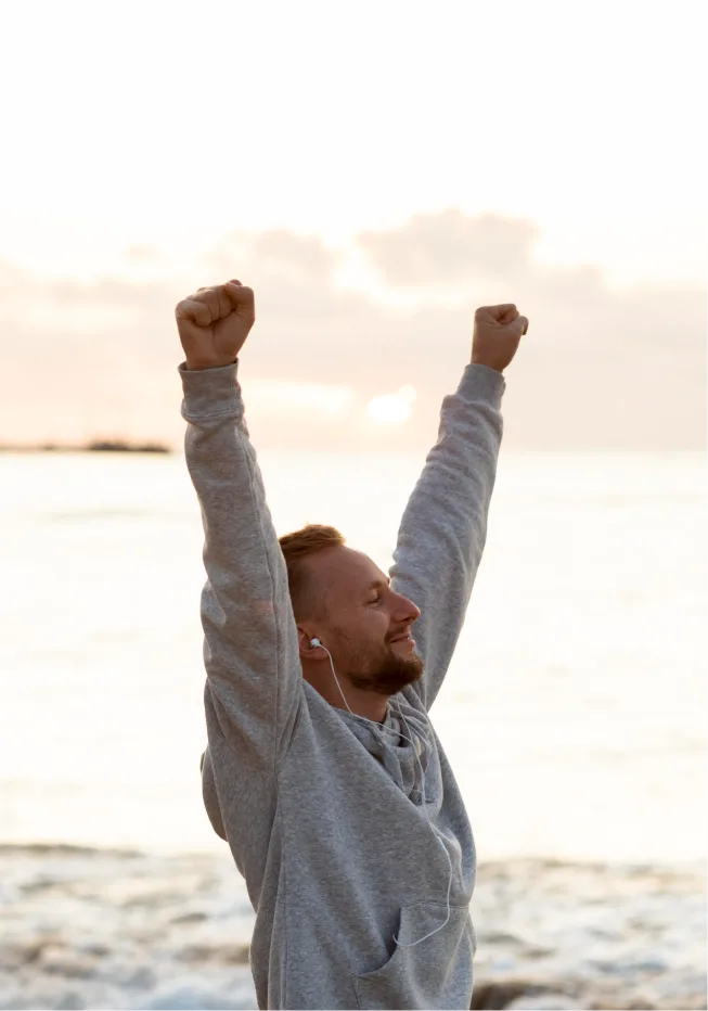 Man feeling energized outdoors after depression counseling in Denver