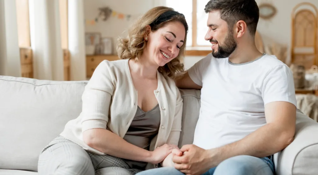 Happy couple after successful affair recovery counseling in Denver