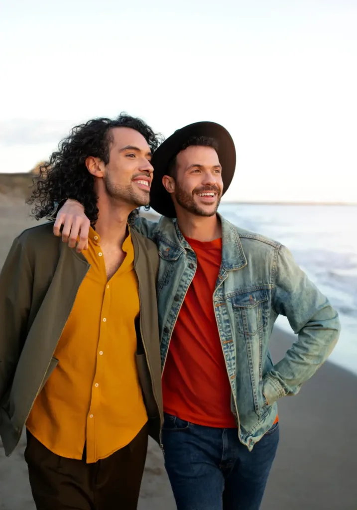 Two men enjoying a strong bond and camaraderie after completing self-esteem counseling in Denver