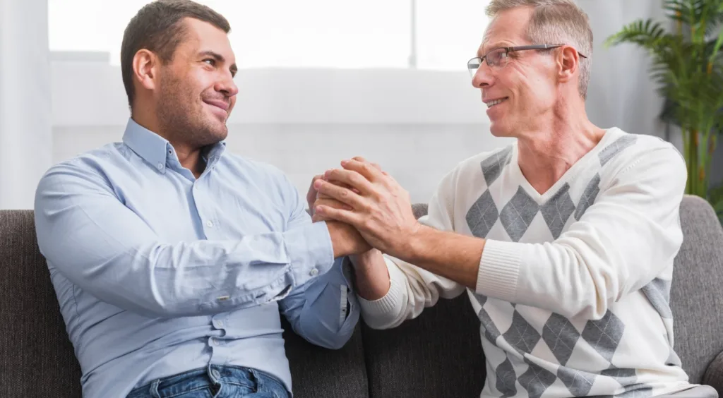 A man expressing gratitude to his therapist after a successful anger management therapy session