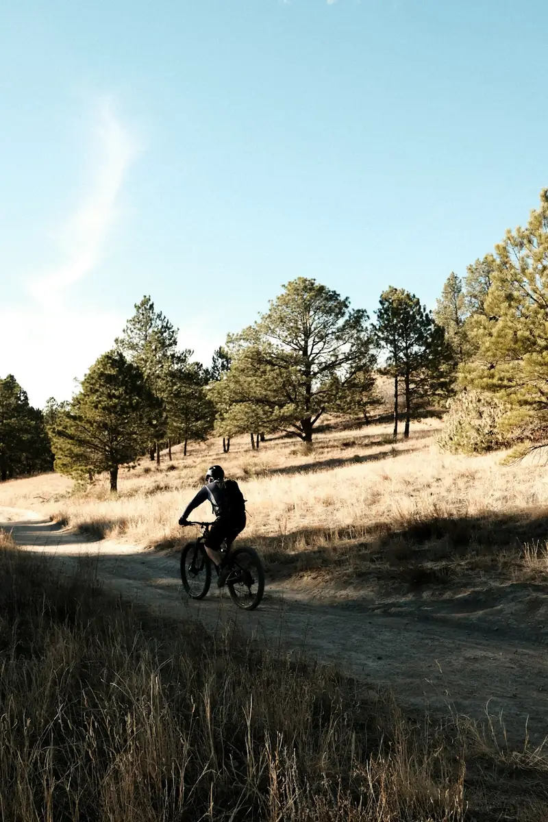 Man mountain biking on a Colorado trail